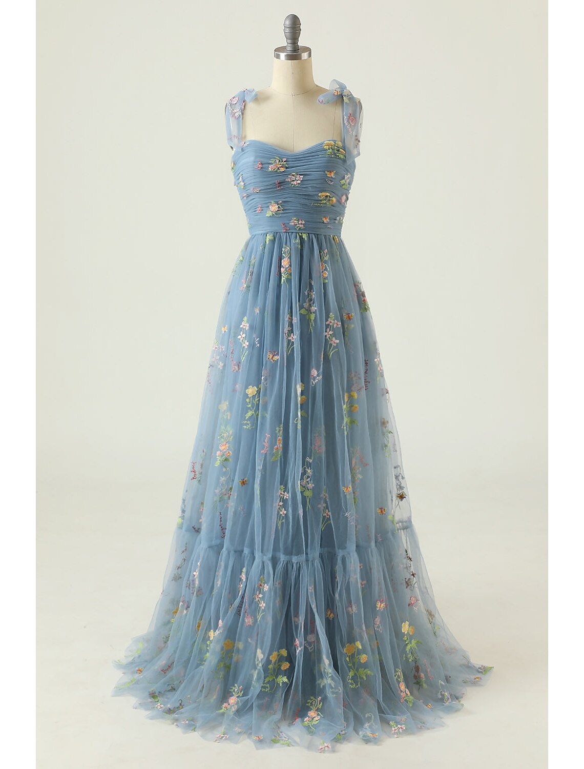 Side view of the floor-length A-line formal gown.
