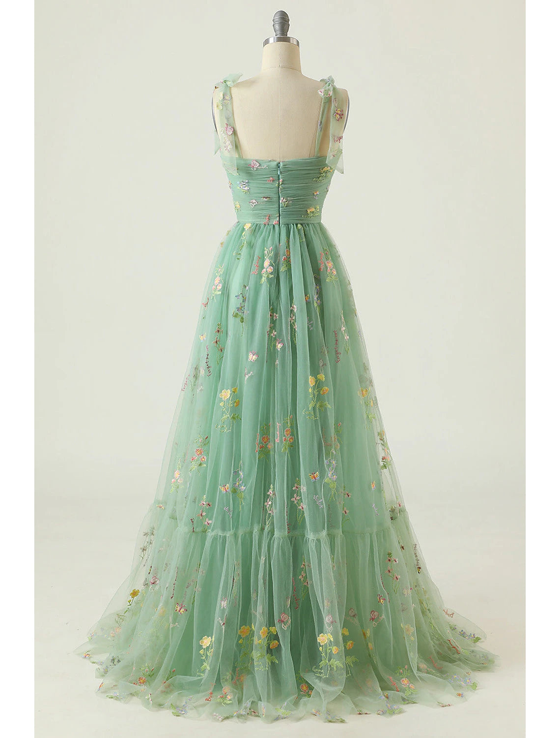 Close-up of the sweetheart neckline and floral lace detail.