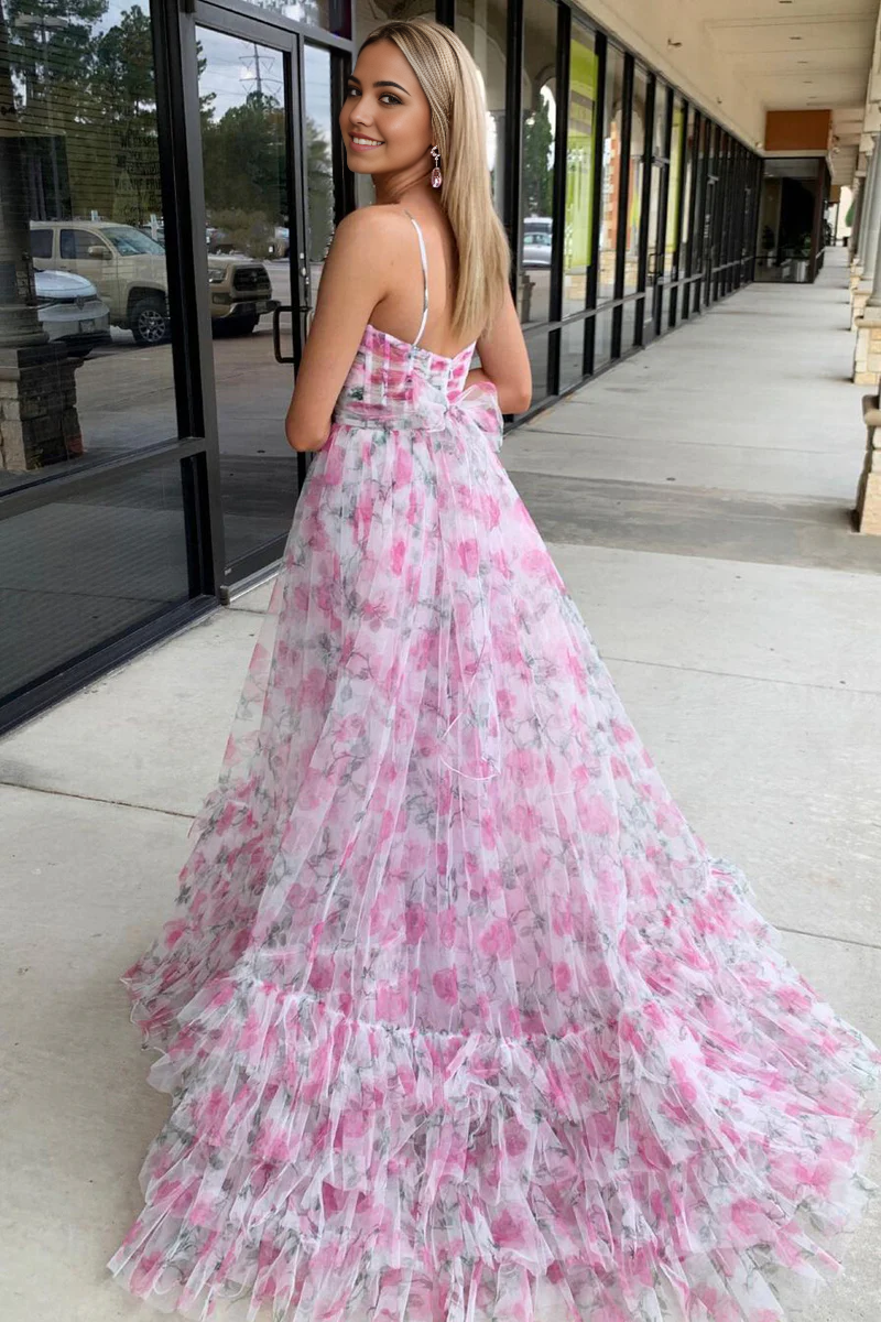 Close-up of floral print and delicate tulle fabric on the prom dress.