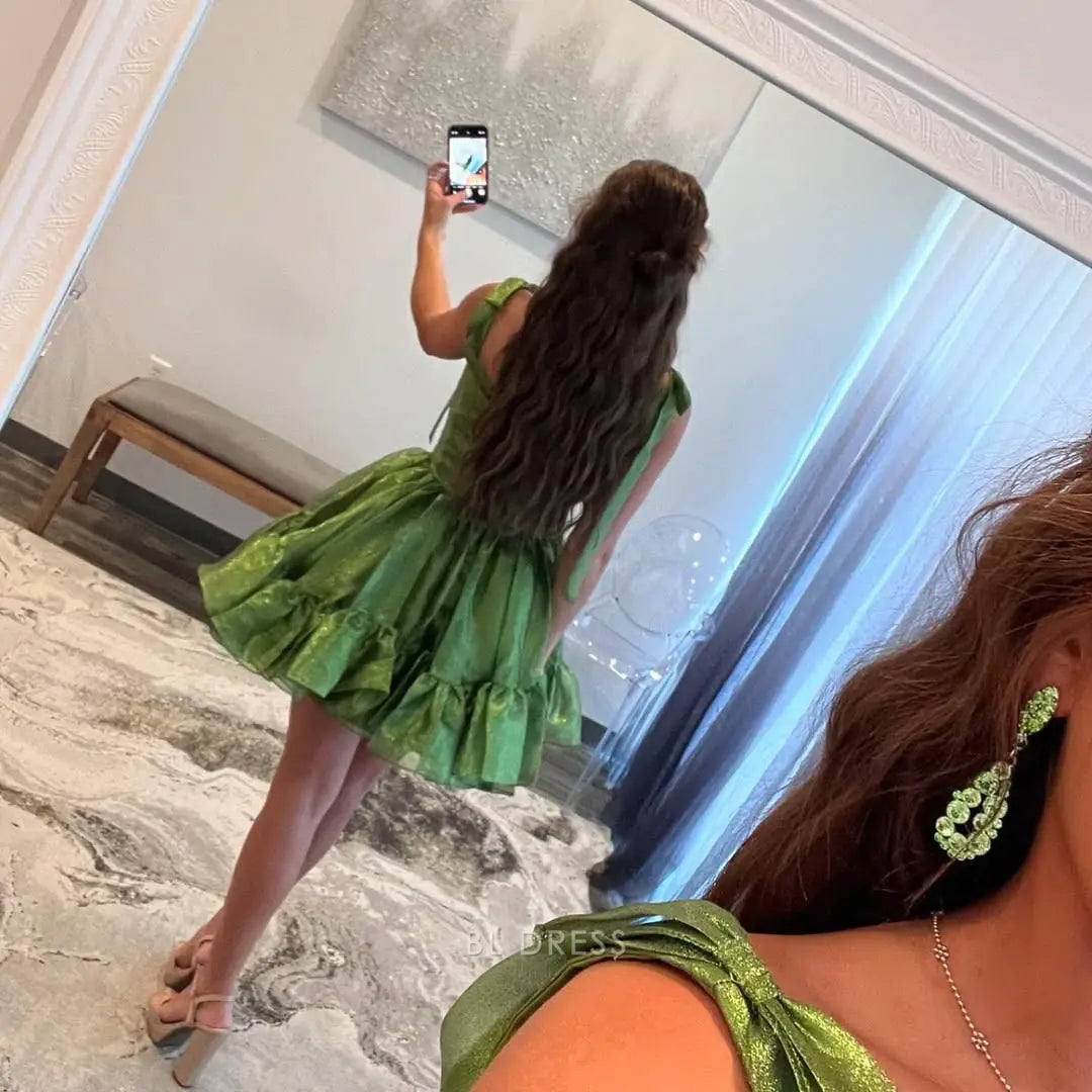 A-line sweetheart green short dress, showcasing its silhouette.