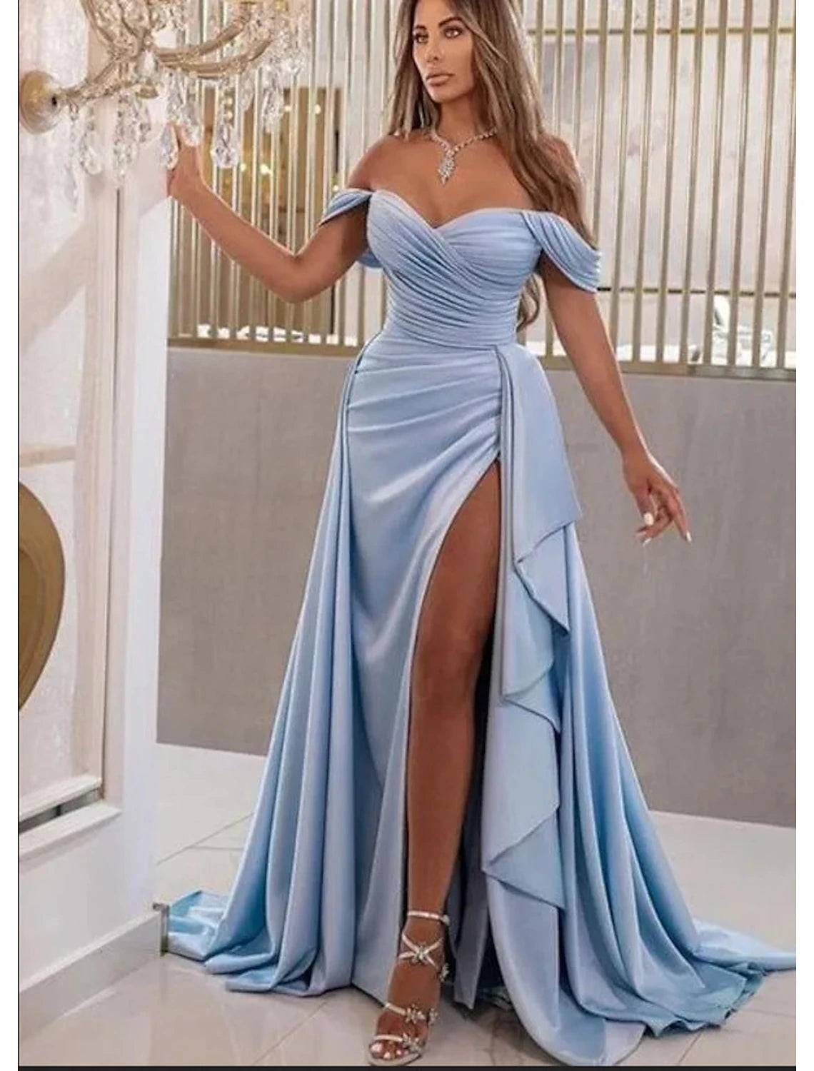 Elegant A-line prom dress with sweetheart neckline, high split, and sweep train.
