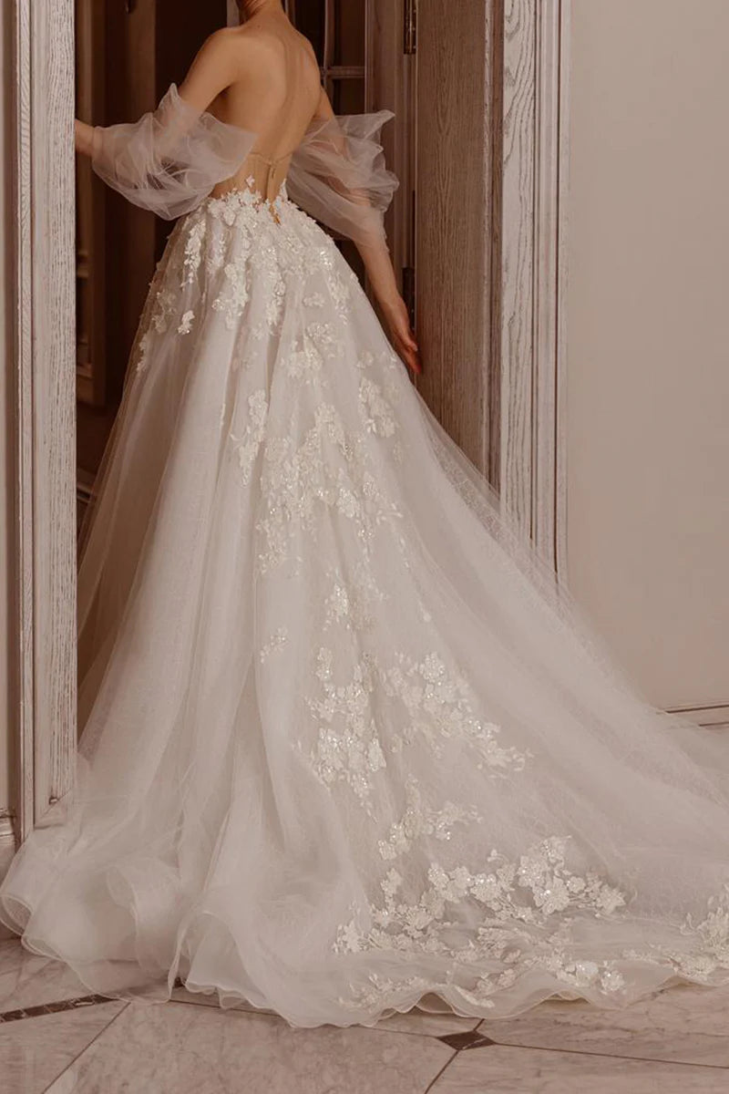 Back view of the A-Line wedding dress showing lace details.