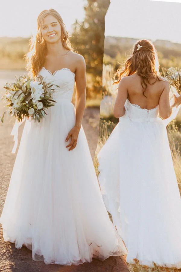 Ivory A-line wedding dress with sweetheart neckline and lace details.