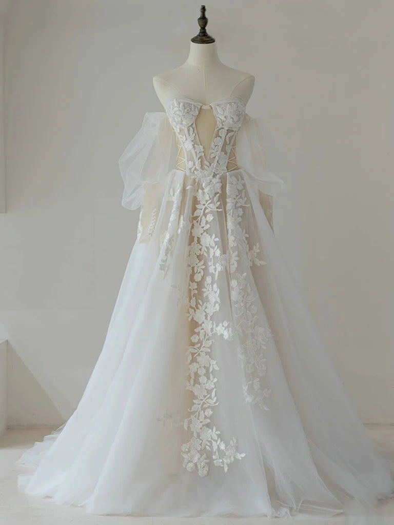 Back view of the A-line lace and tulle long prom dress.