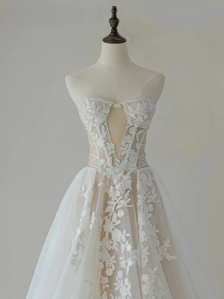 Close-up of the delicate lace bodice on the prom dress.