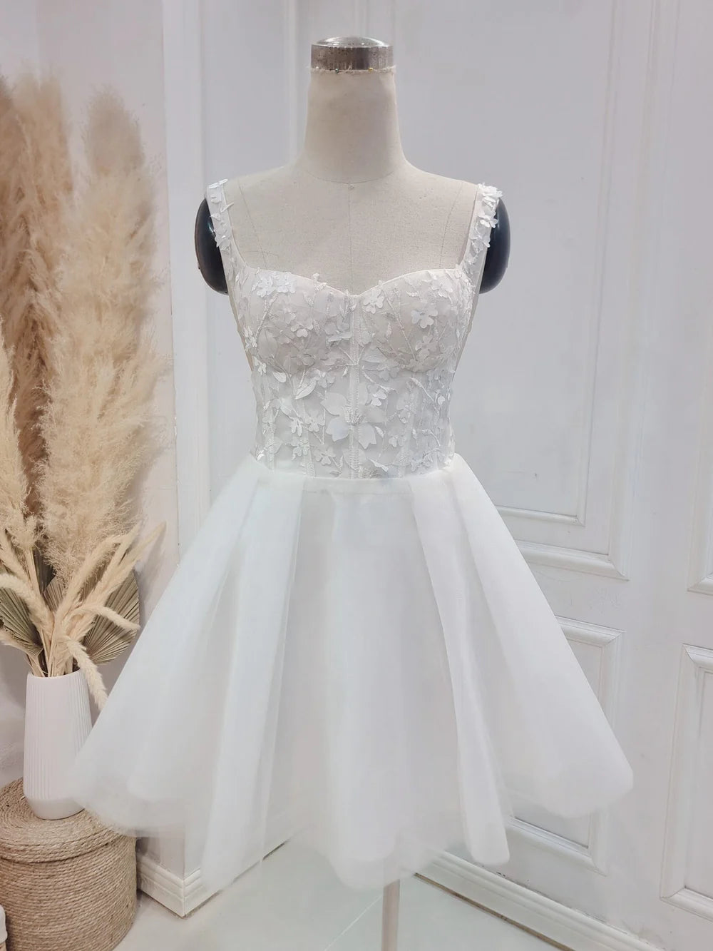 Front view of an elegant A-line sweetheart lace wedding dress.