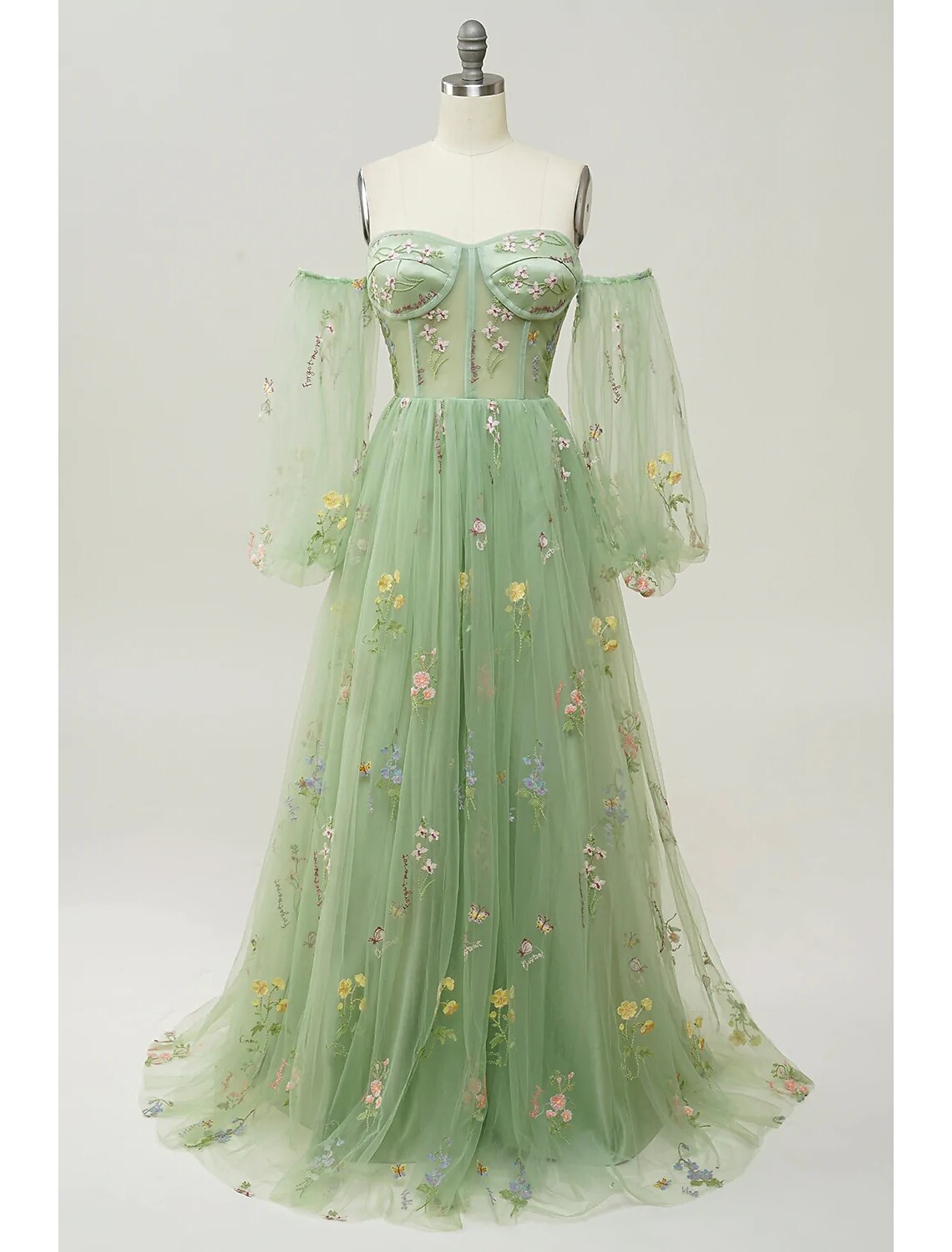 Elegant A-Line floral lace evening gown with sweetheart neckline and long sleeves.