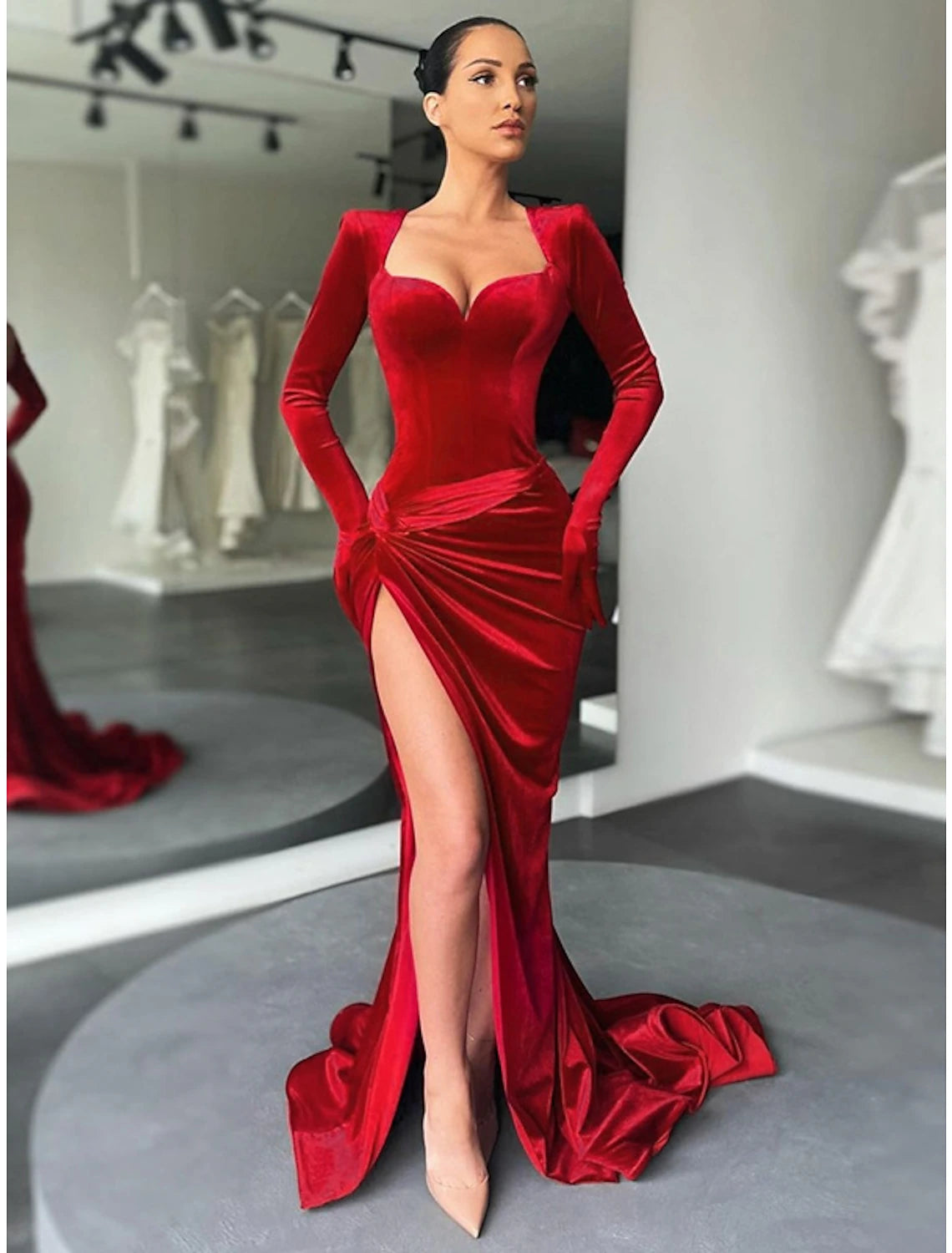 Elegant A-Line sweetheart velvet gown in red with long sleeves and ruched slit.