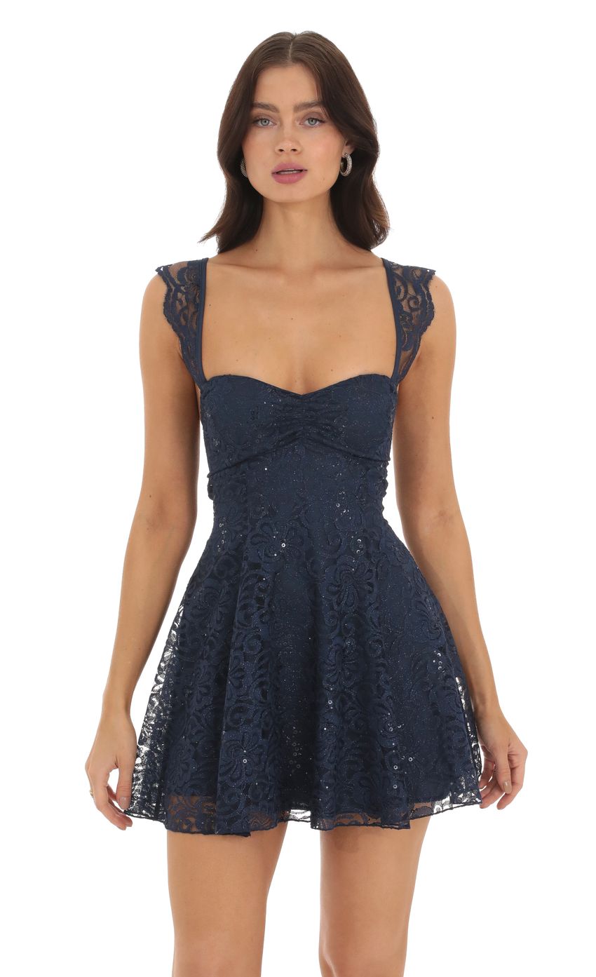 Navy blue lace A-line mini homecoming dress with sweetheart neckline and lace-up back.
