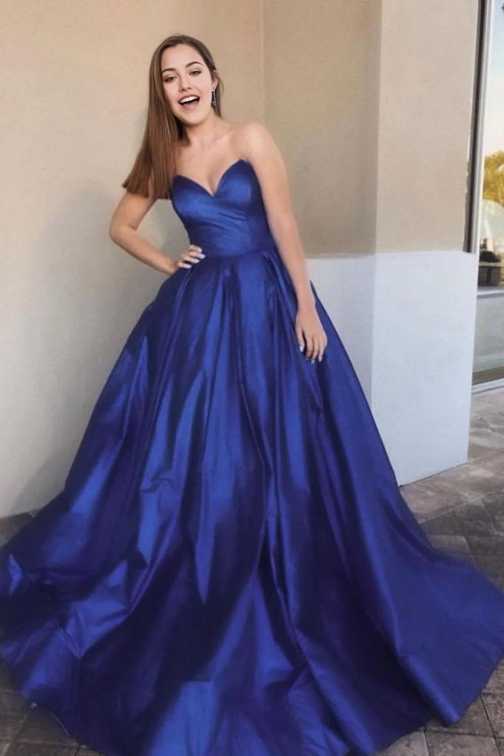 Navy blue A-line long prom evening gown with a sweetheart neckline.
