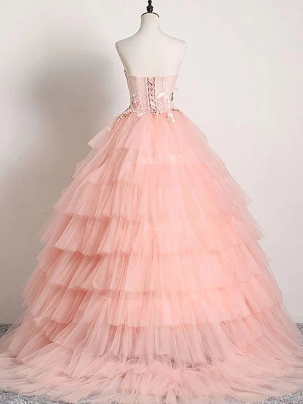 Backless design of the lace applique prom dress.