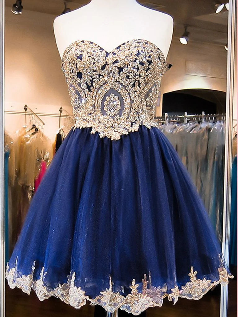 Elegant A-line short prom dress with sweetheart neckline, delicate lace, and a stylish backless design.