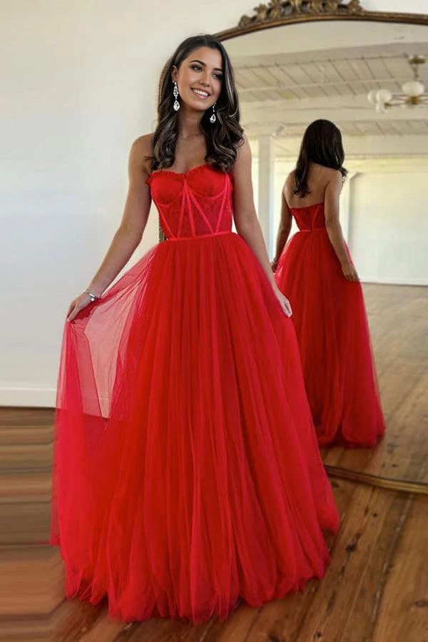 Back view of a black A-line formal gown with delicate lace.