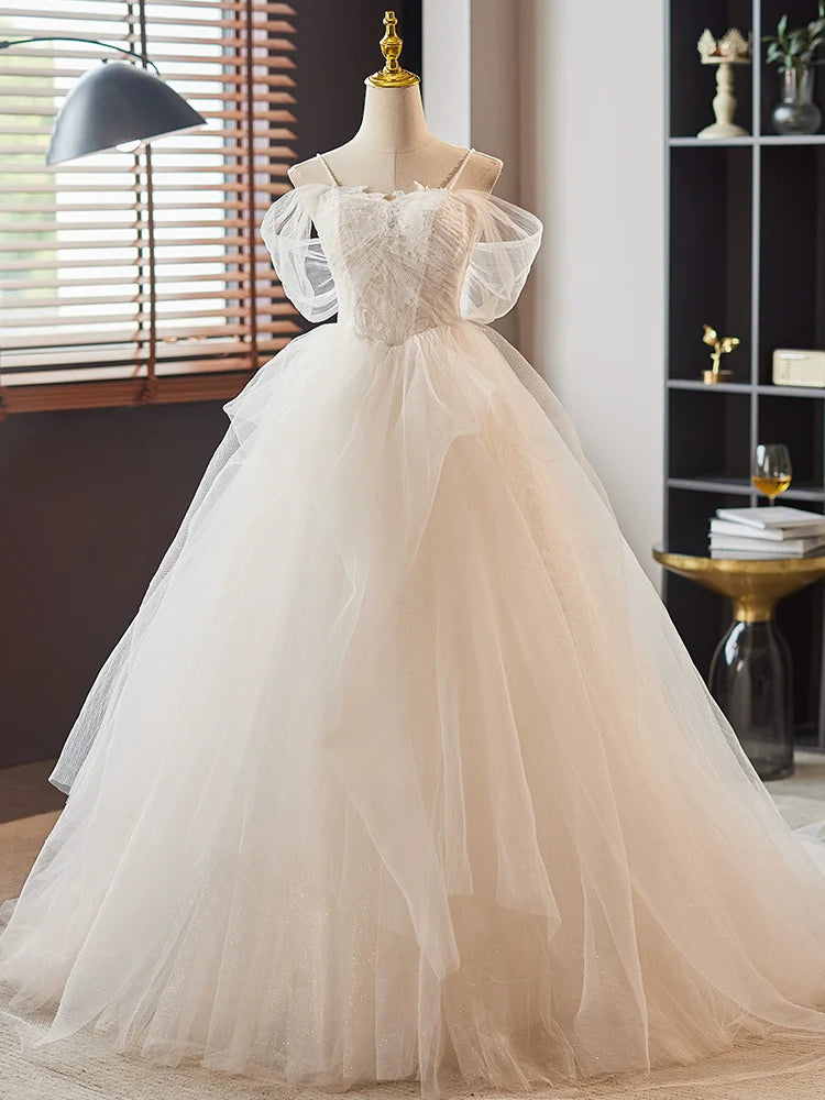 Model wearing an elegant A-line sweetheart neck lace tulle long prom dress, front view.