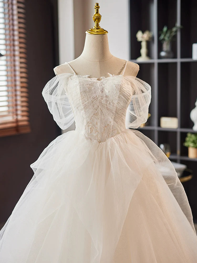 Close-up of the sweetheart neckline and lace bodice on the A-line prom dress.