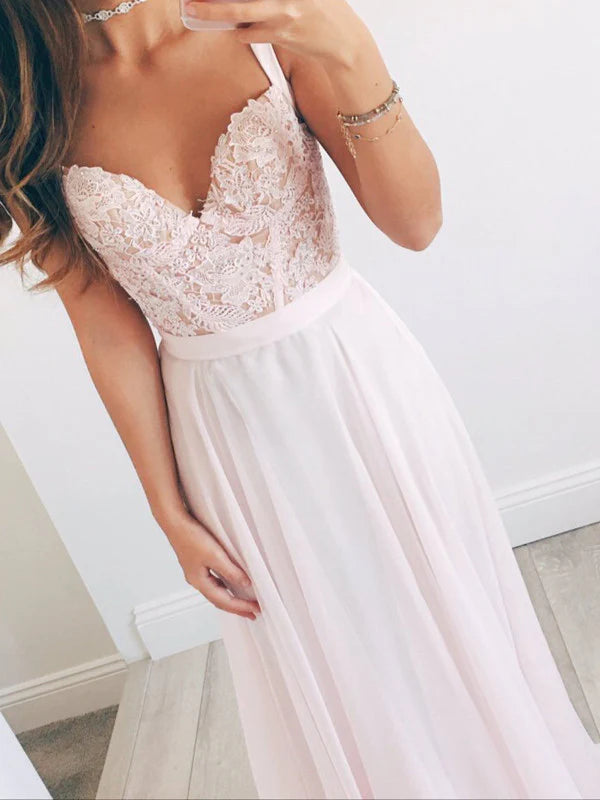 Elegant A-line long lace dress with a sweetheart neckline, suitable for formal events.