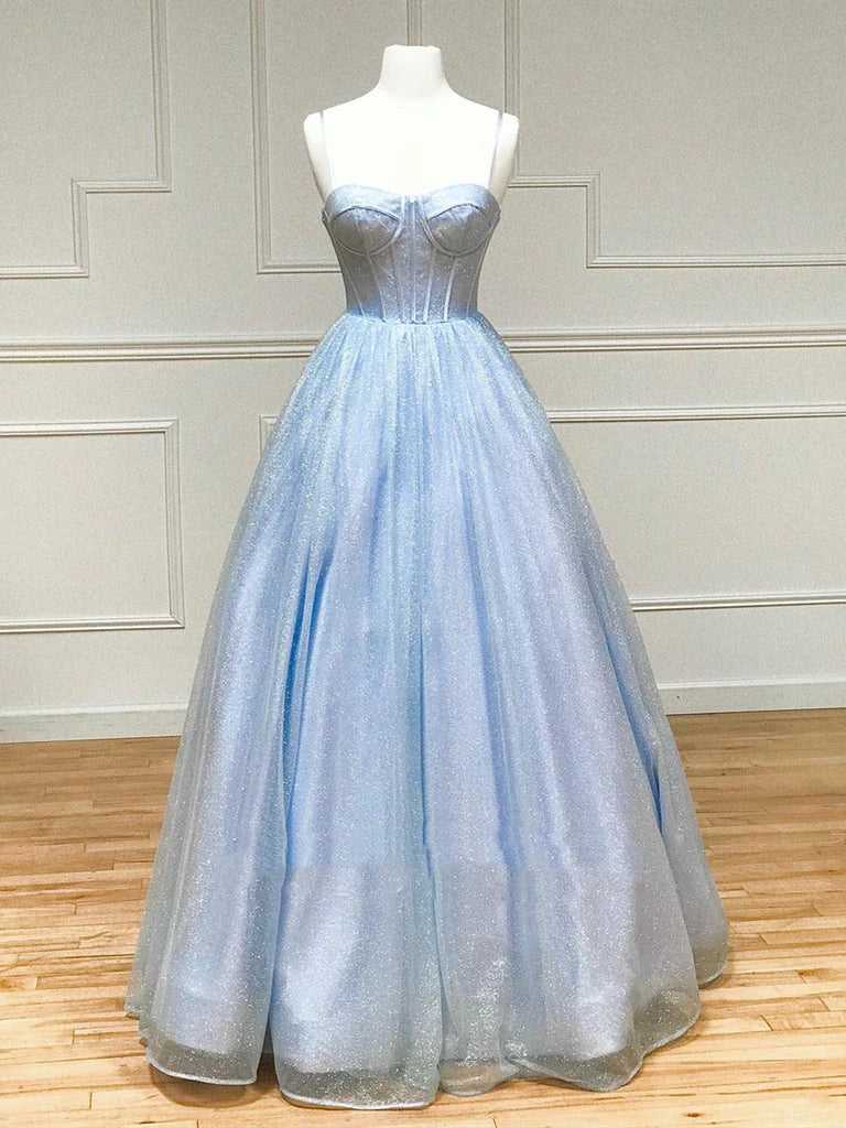 Woman wearing an elegant A-line sweetheart neck prom dress.