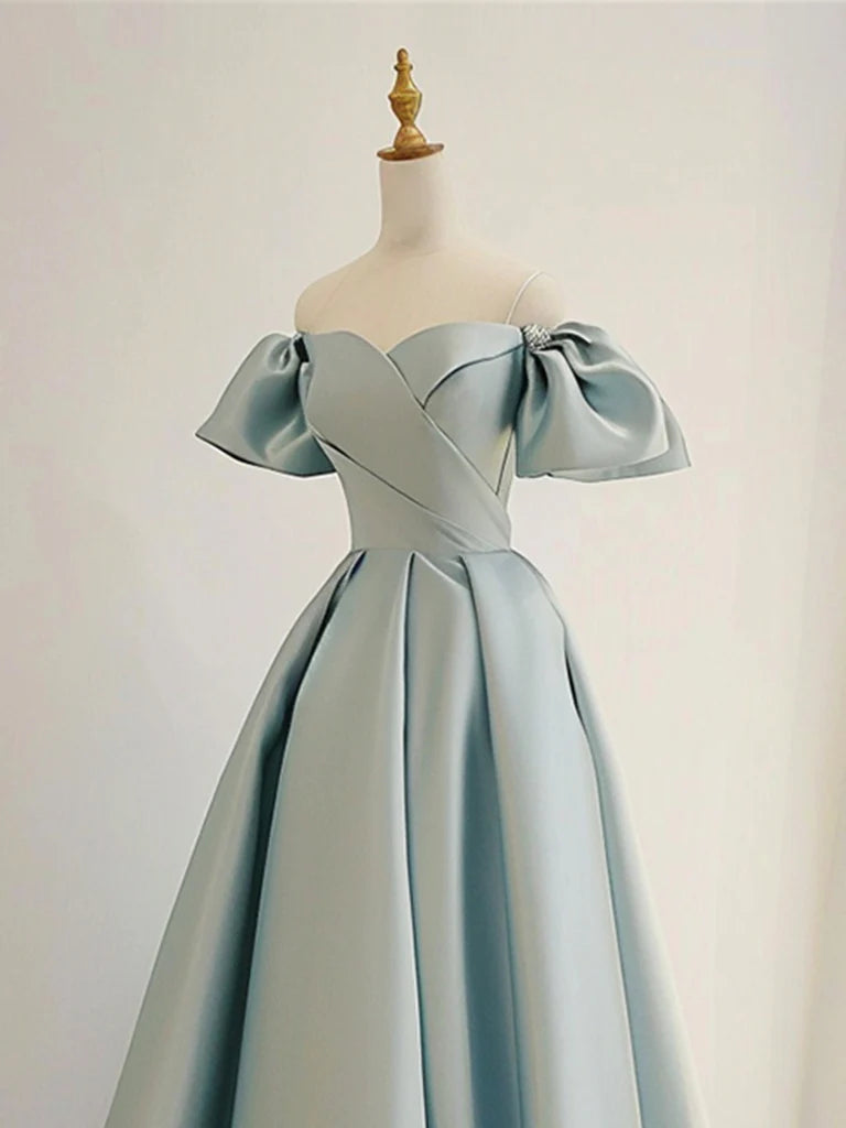 Full view of a long formal satin gown with A-line silhouette.