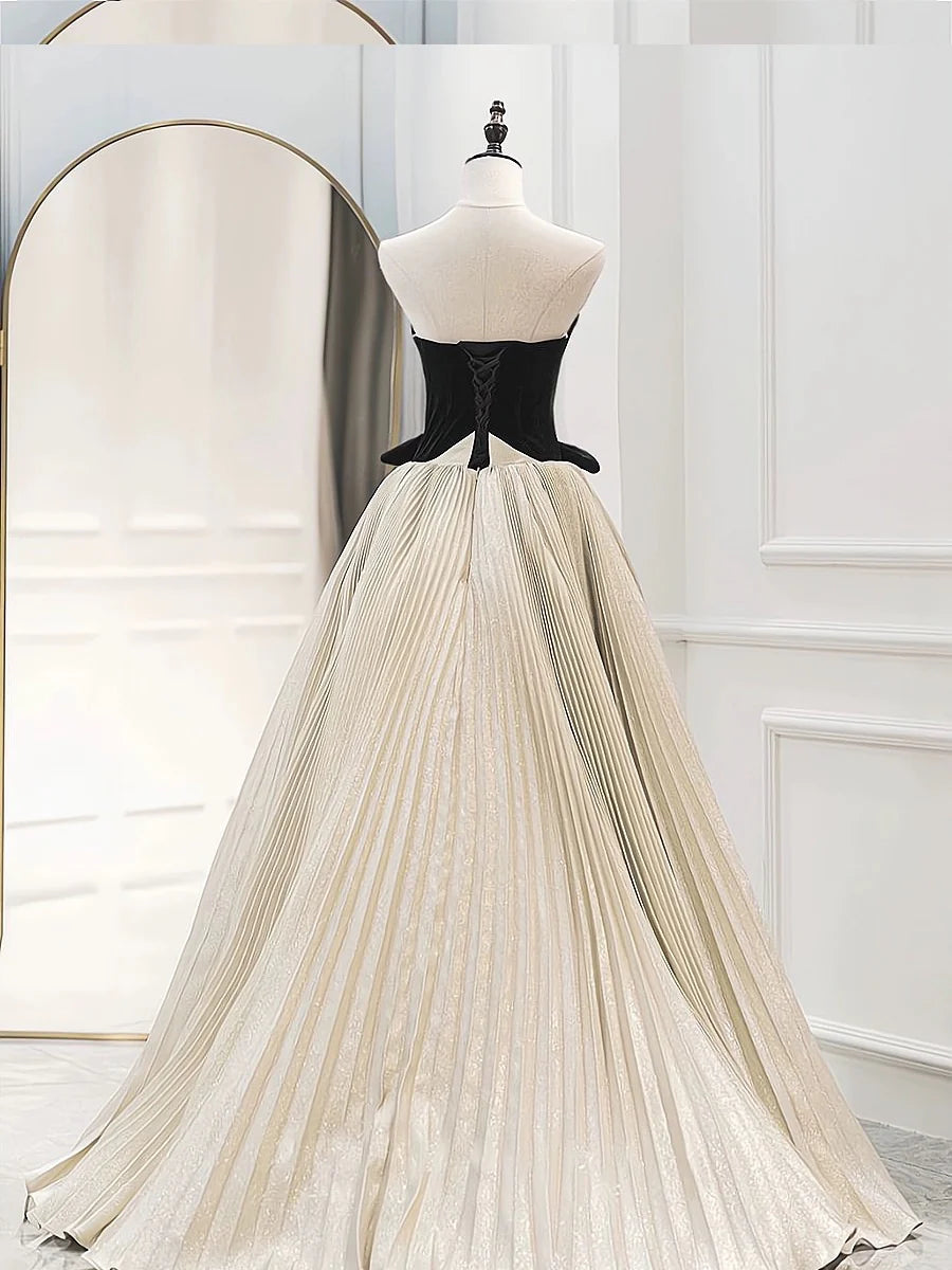 Close-up of the sweetheart neckline and luxurious satin velvet fabric of the prom dress.