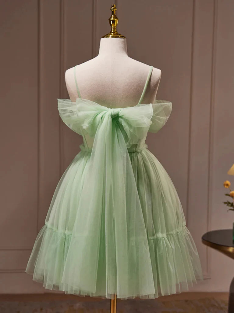 Back view of a model in a short A-line sweetheart neck homecoming dress.