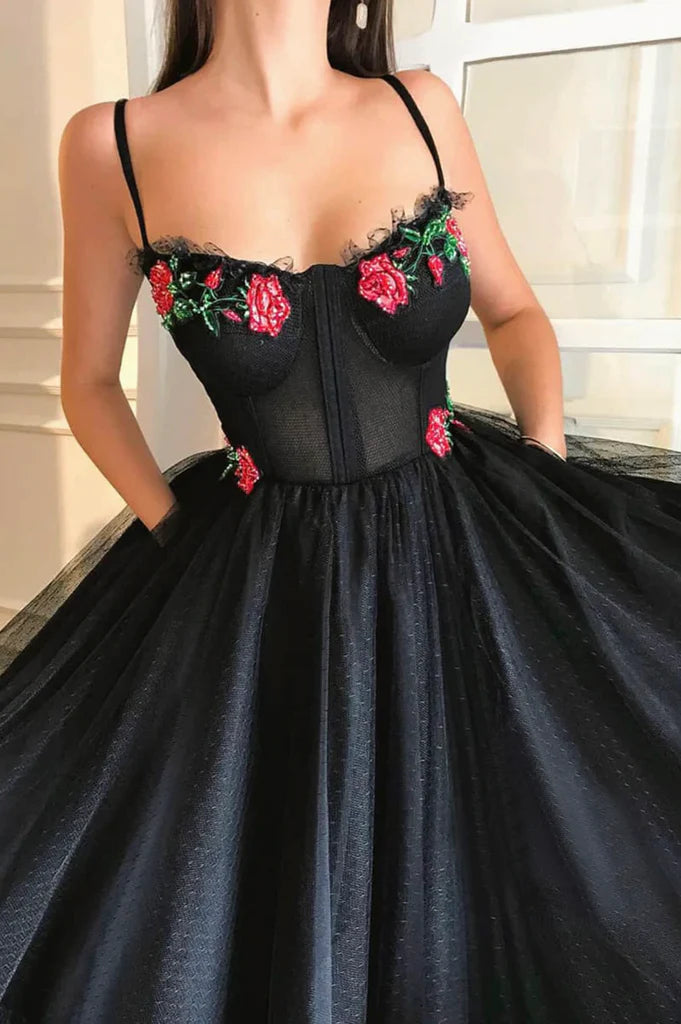 Close-up of the sweetheart neckline and lace details on the A-line prom dress.