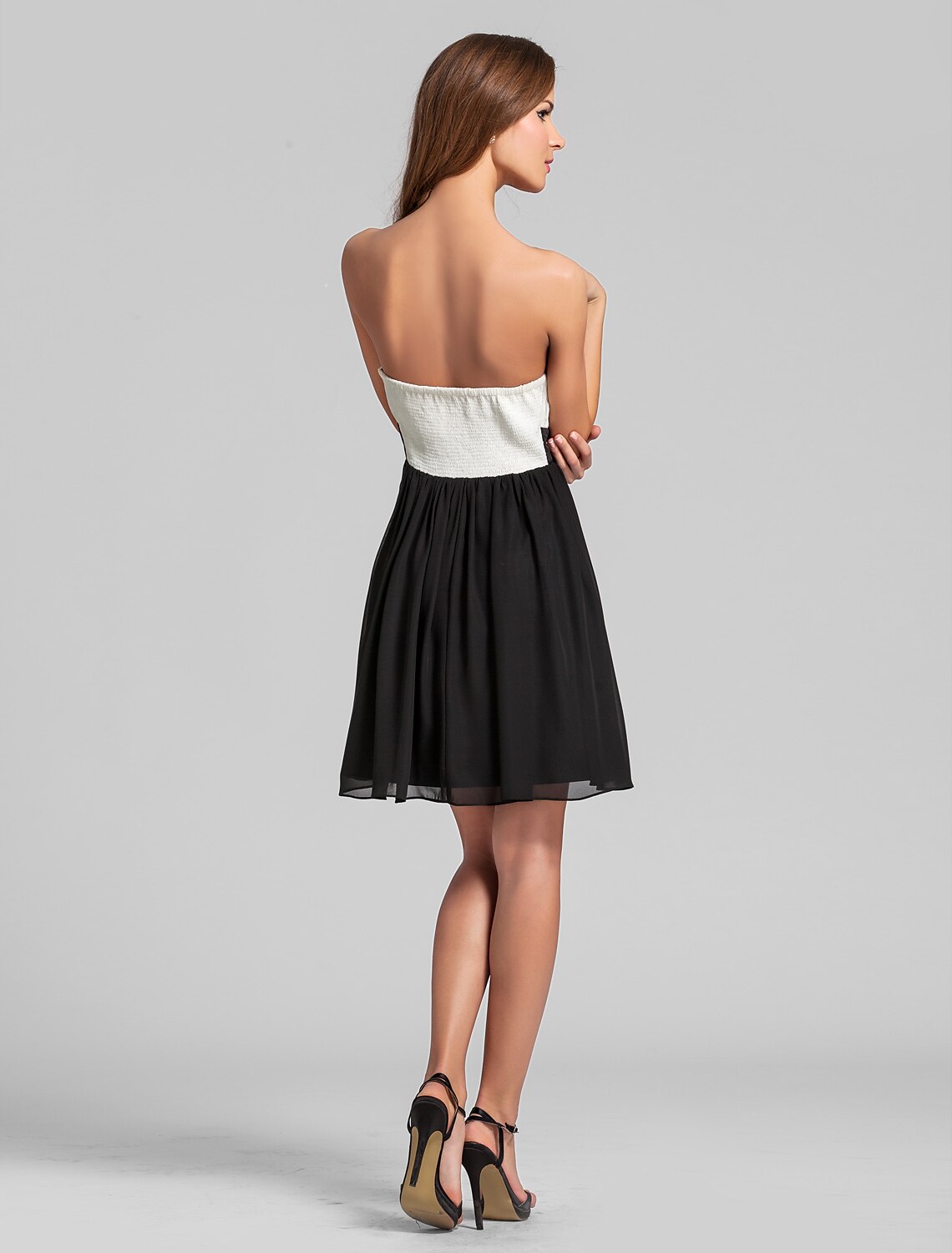 Close-up of the sweetheart neckline and draped bodice of the chiffon bridesmaid dress.