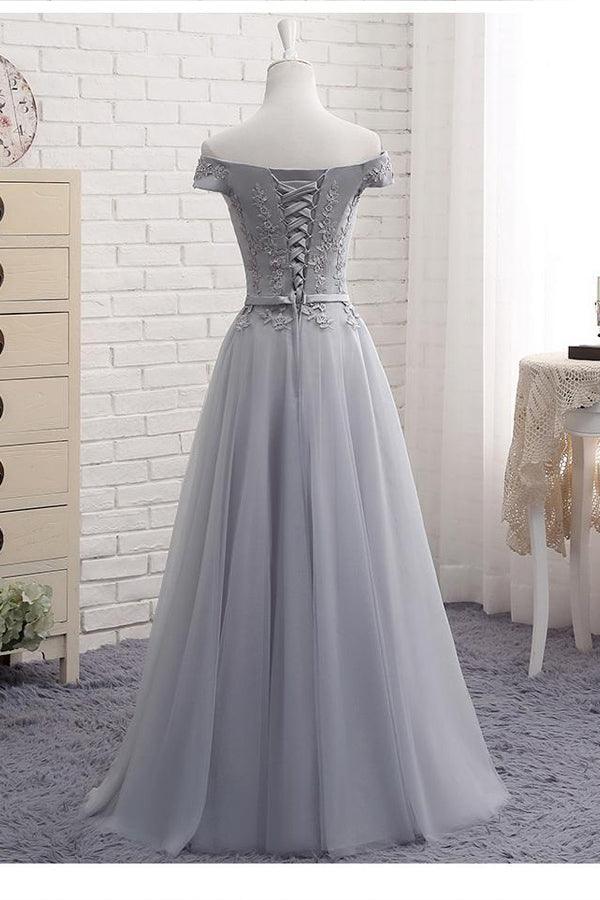 Back view of the elegant A-line prom dress with lace embellishments.