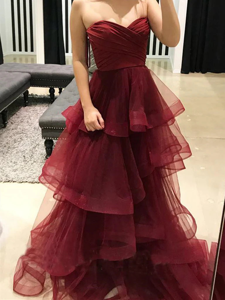 Elegant A-line long prom dress with sweetheart neckline and pleated ruffles.