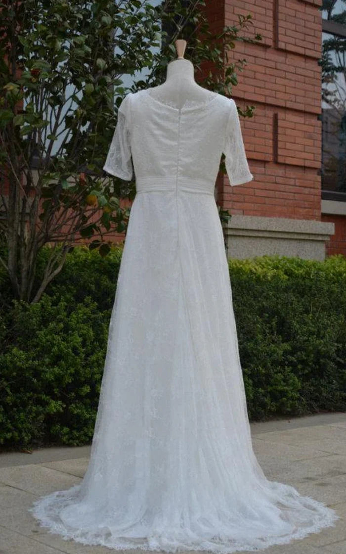 Back view of a romantic A-line bridal gown featuring delicate tulle and illusion sleeves.