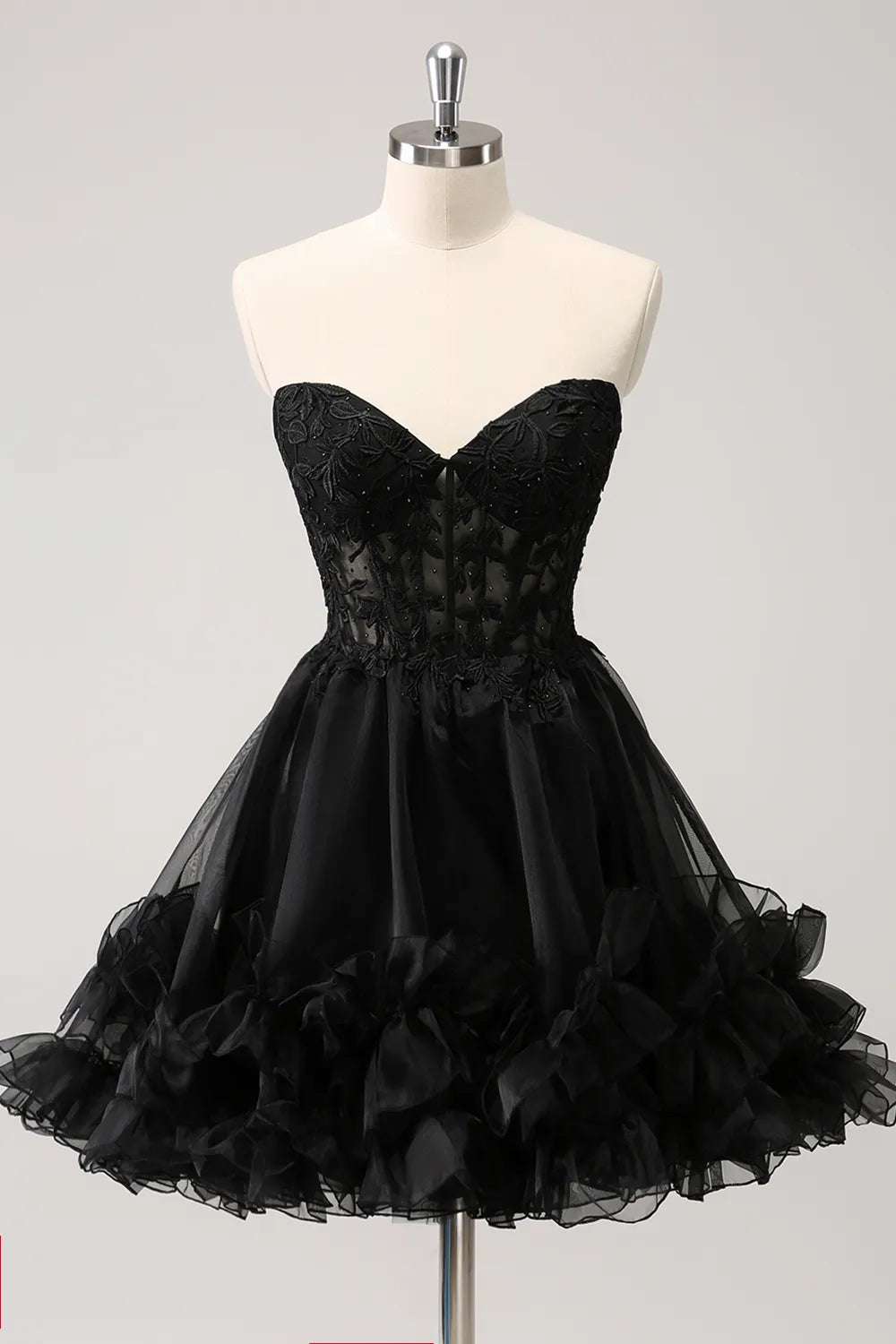 Black A-Line short homecoming dress with sweetheart neckline and ruffles.