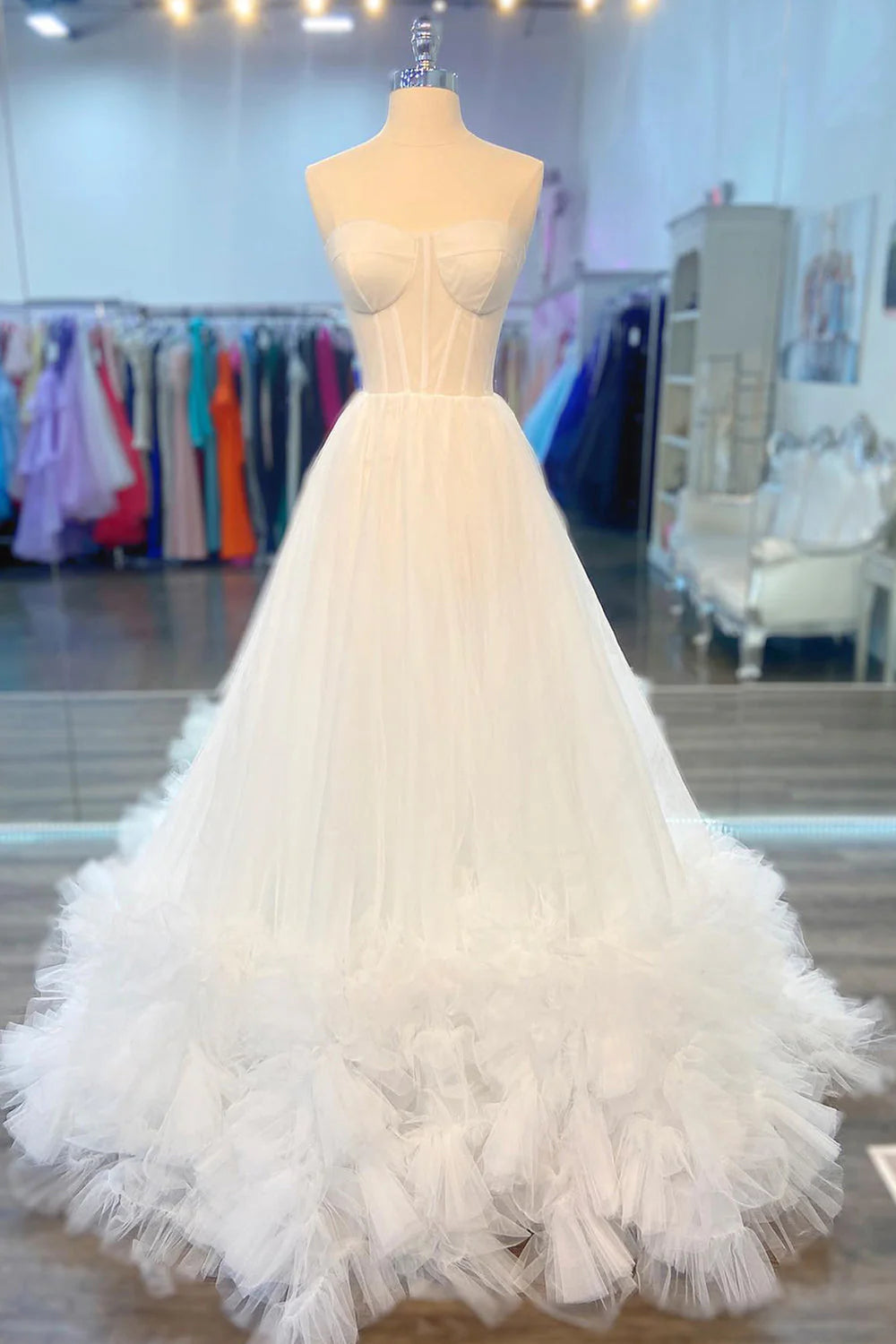 Elegant A-line sweetheart long prom dress with cascading ruffles.