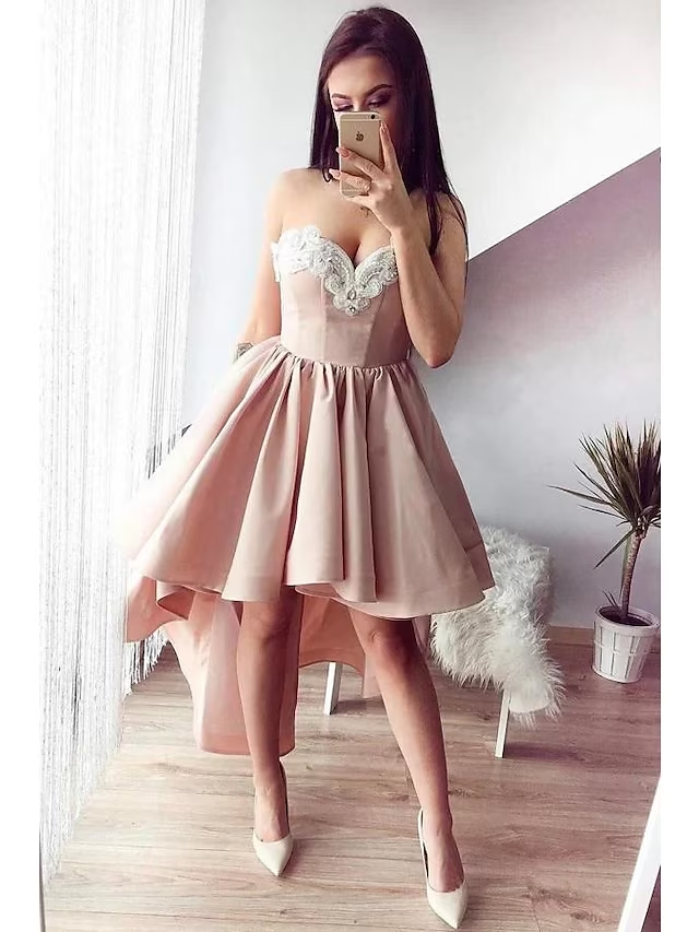 A-line sweetheart satin asymmetrical backless homecoming dress with appliques.