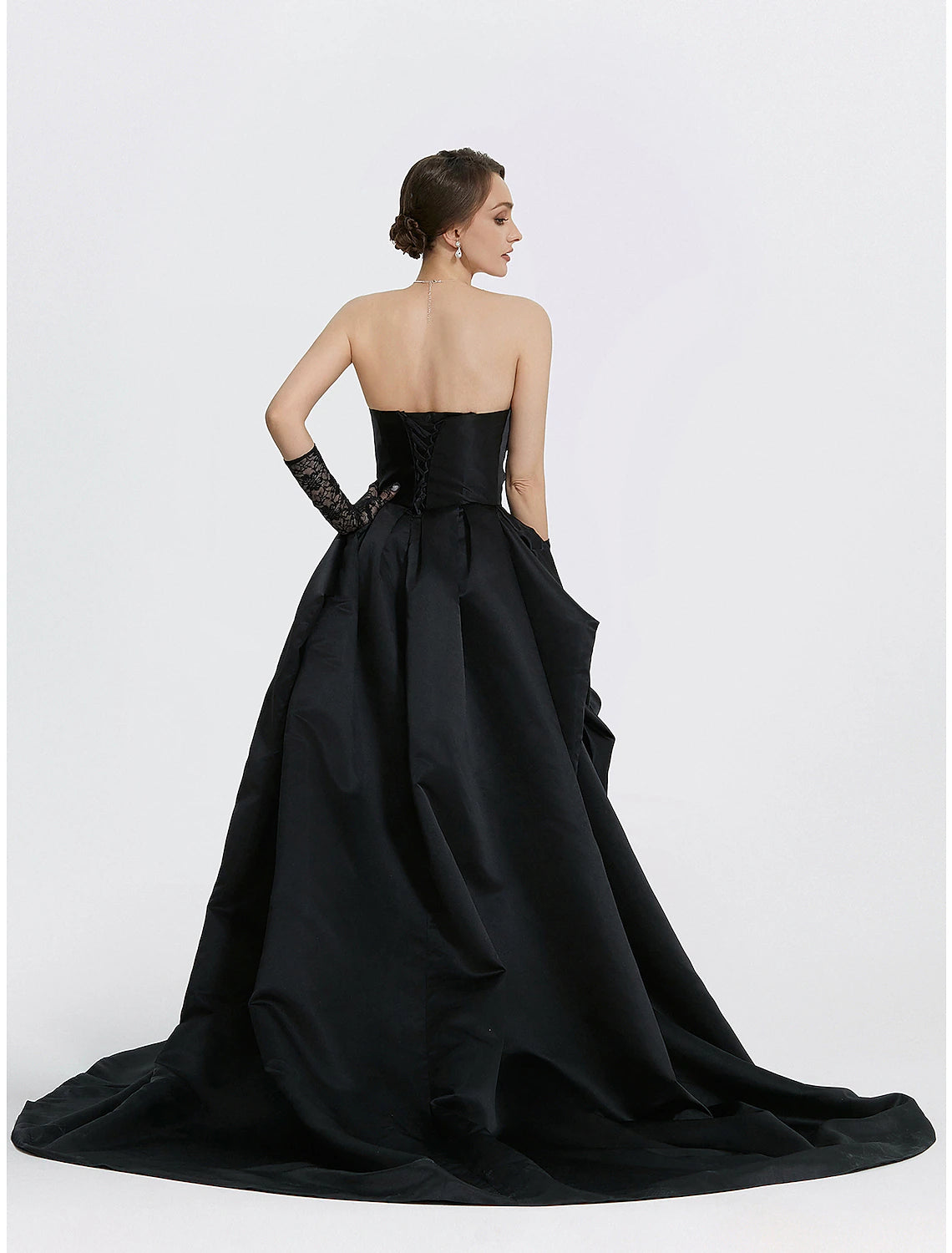 Back view of the navy blue A-line evening gown, showcasing the sweep train.