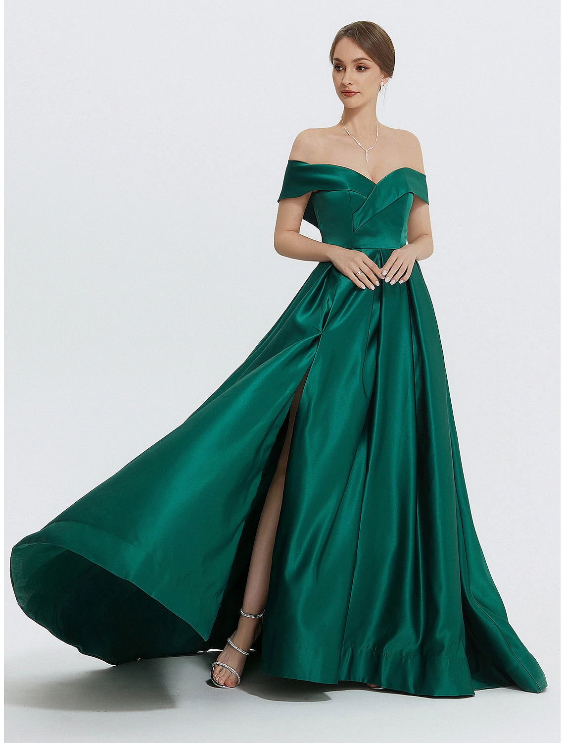Side view of a model wearing the A-Line satin formal dress.