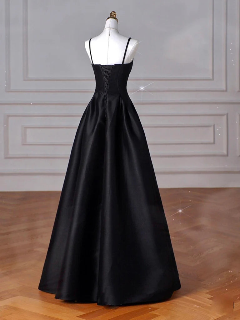 Side profile of a long satin A-line gown, showcasing its flowing silhouette.