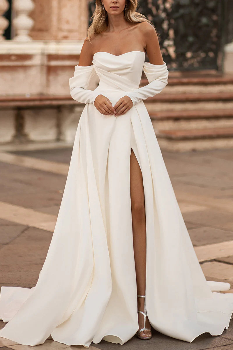 Elegant A-line sweetheart satin long sleeve wedding dress, front view.