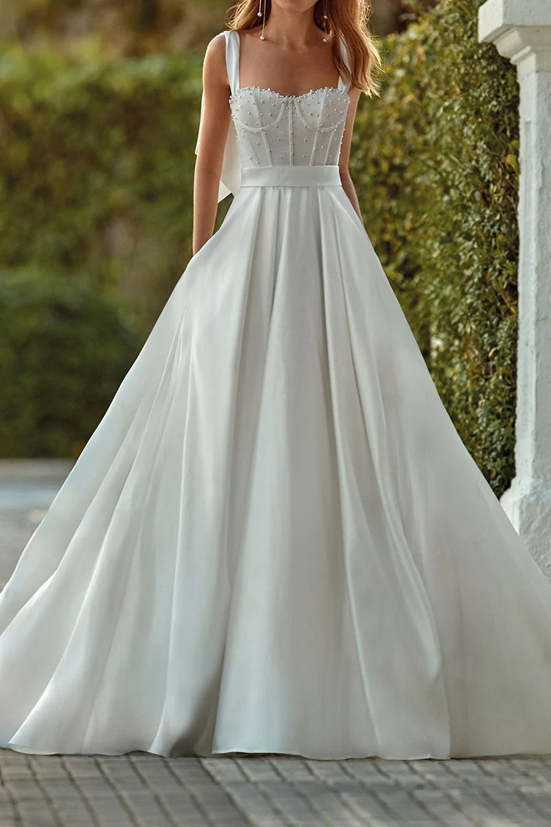 Front view of elegant A-line sweetheart satin wedding dress.
