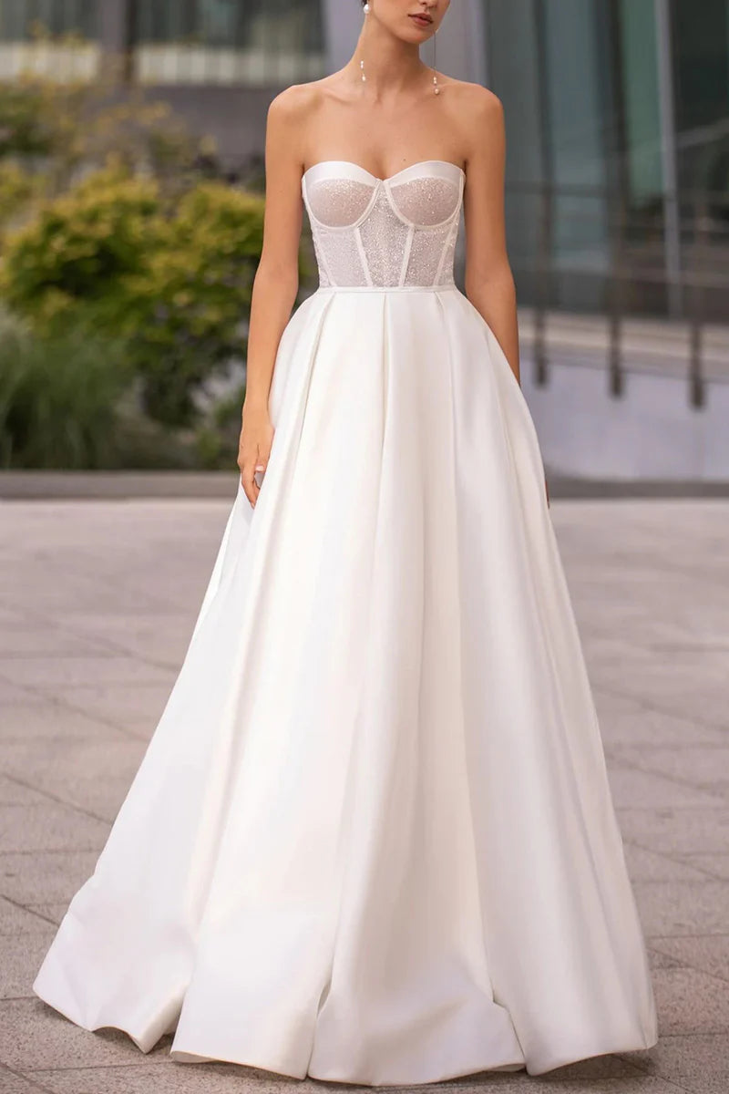 Elegant A-line satin wedding dress with sweetheart neckline, front view.