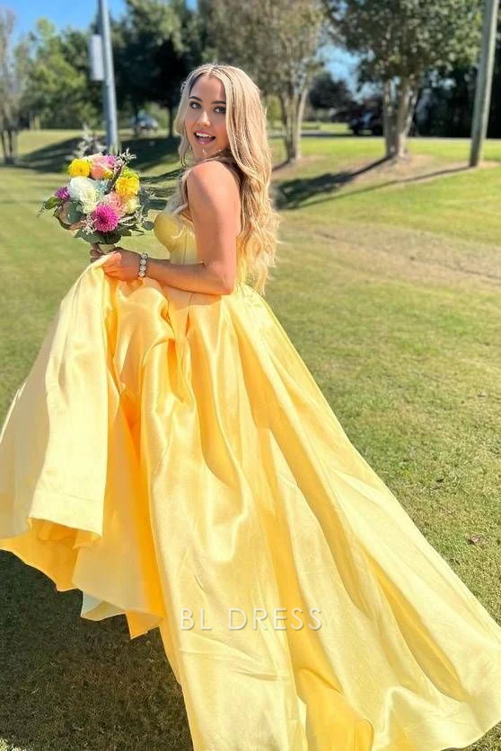 Elegant yellow satin prom dress, A-line silhouette.