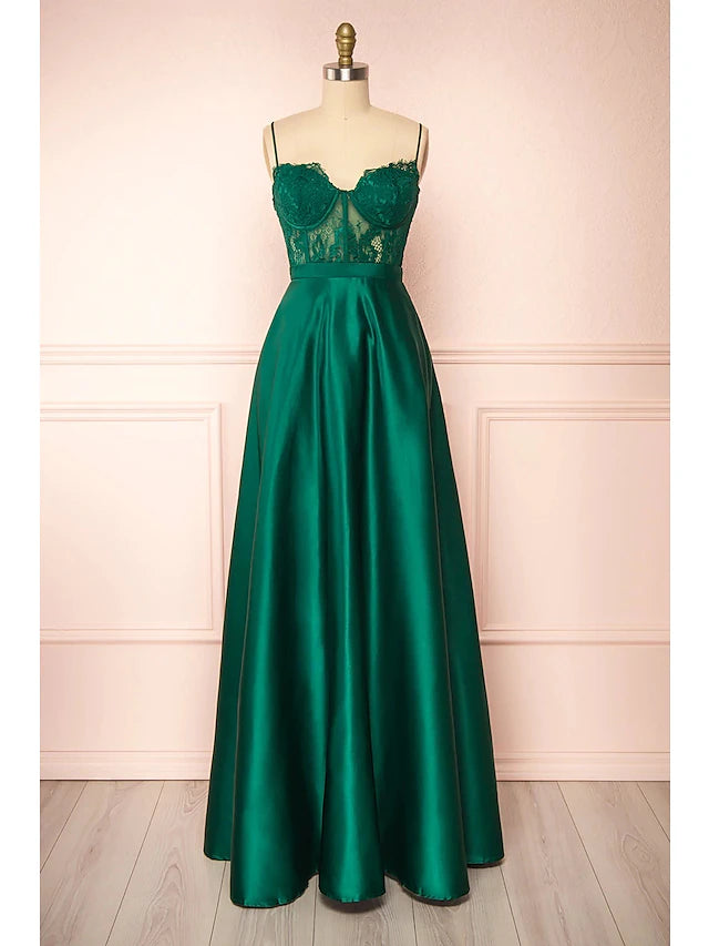 Model wearing an elegant A-line sweetheart prom dress with appliques.