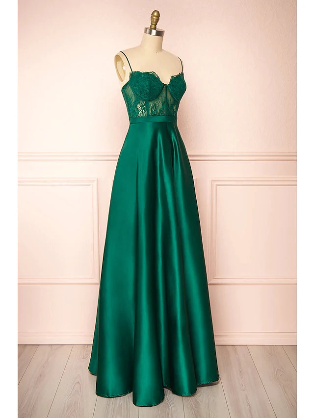 Close-up of the sweetheart neckline and see-through applique details on the prom dress.