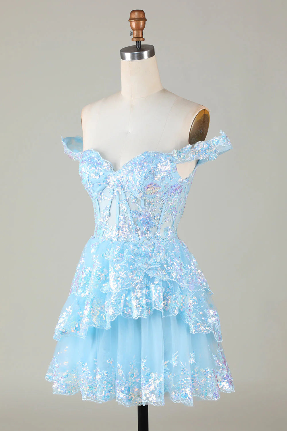 Close-up of the lace and sequin embellishments on the A-Line homecoming dress.