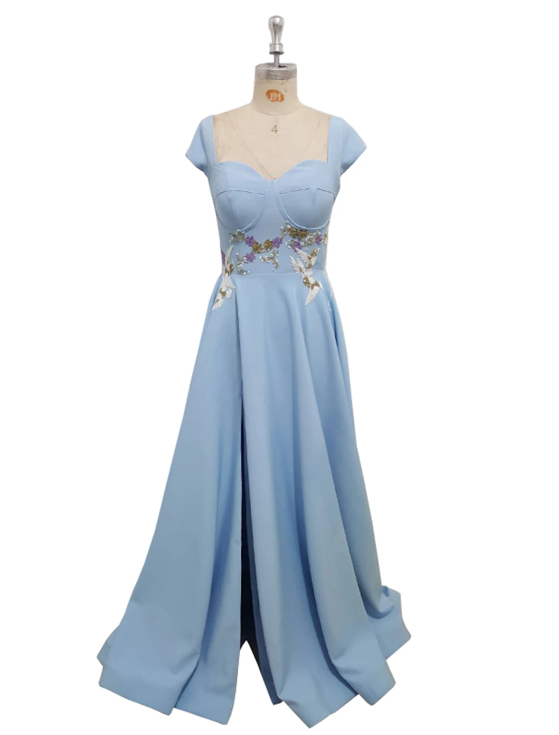 Elegant A-line evening gown with sweetheart neckline and short sleeves, adorned with appliques.