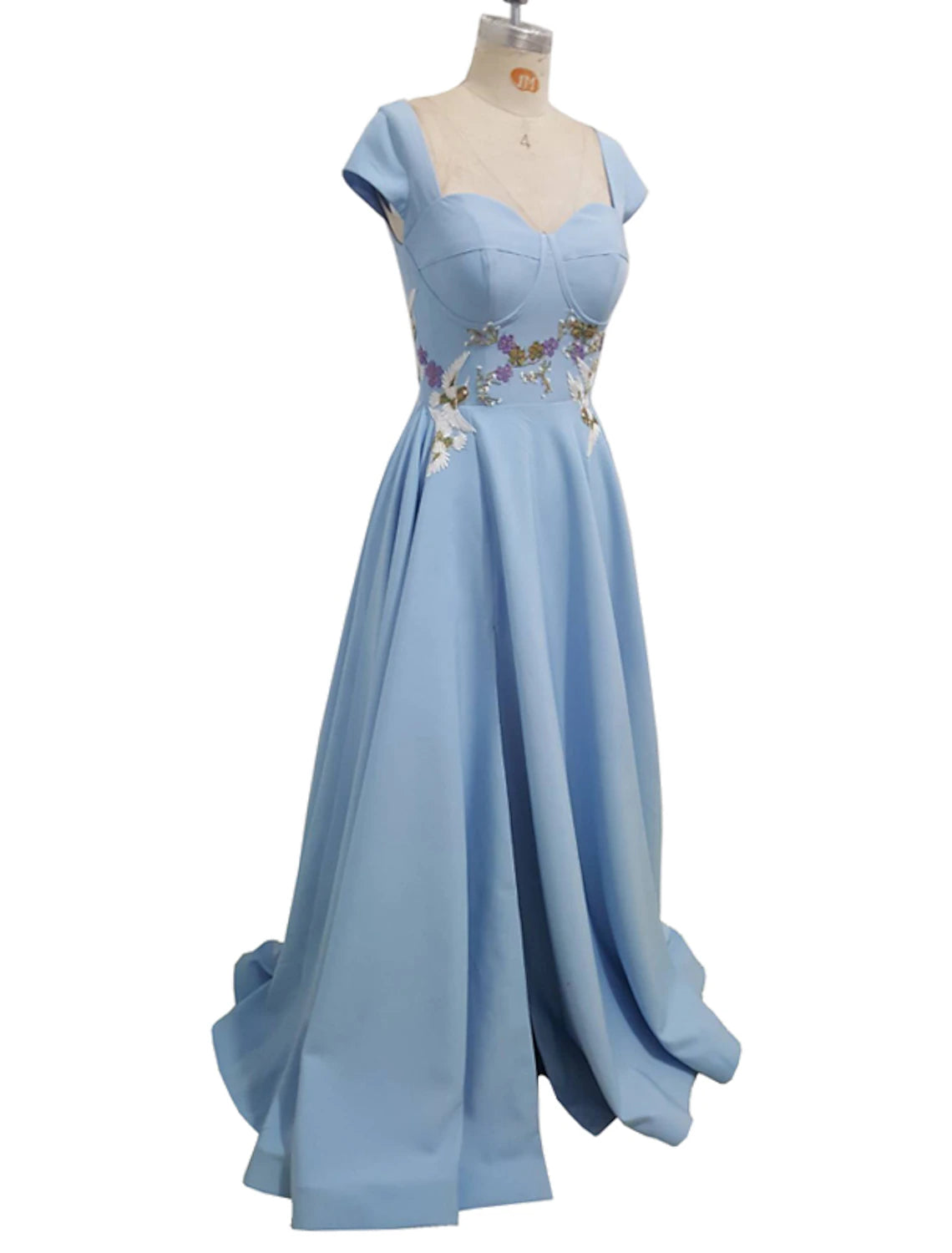 Back view of the A-line evening gown, showcasing the floor-length silhouette.