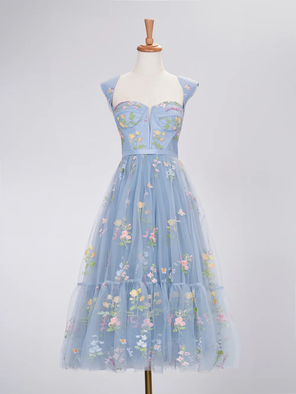 Elegant A-line sweetheart long prom dress with intricate embroidery.