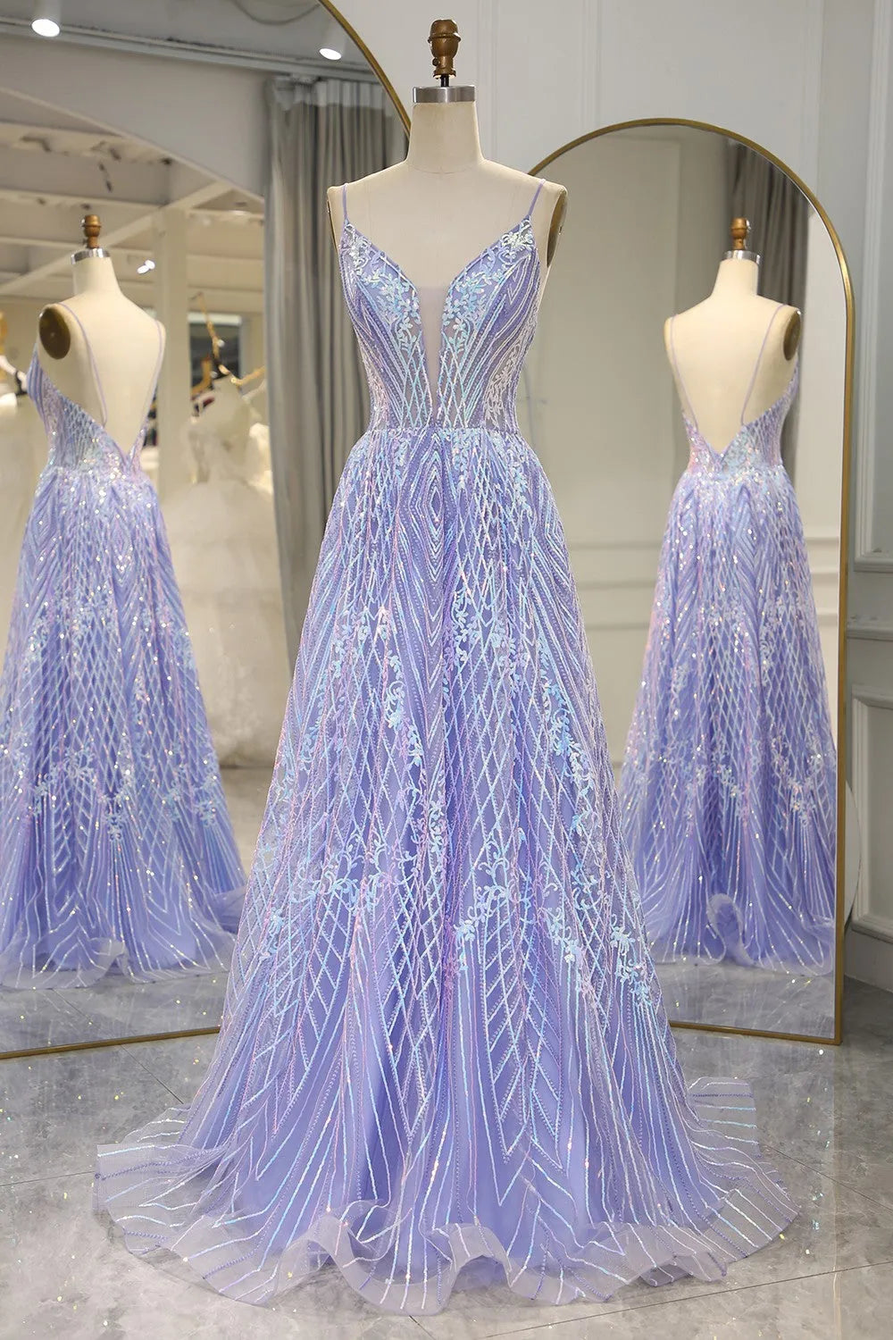 Side view of long A-line prom dress with flowing skirt.