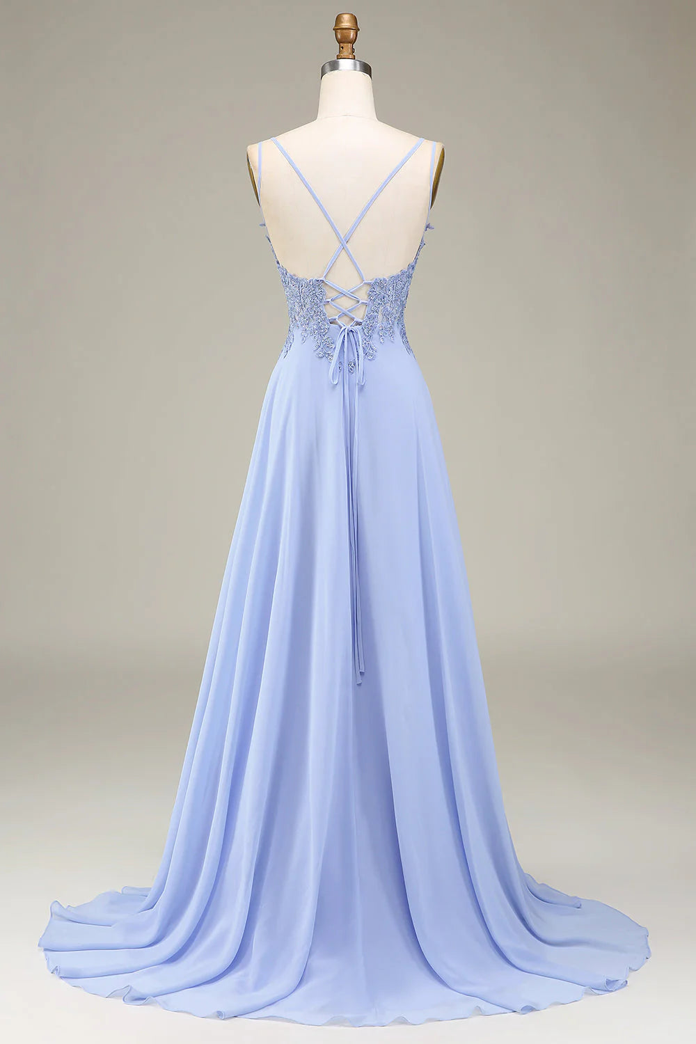 Back view of a lavender A-Line prom dress with flowing skirt.