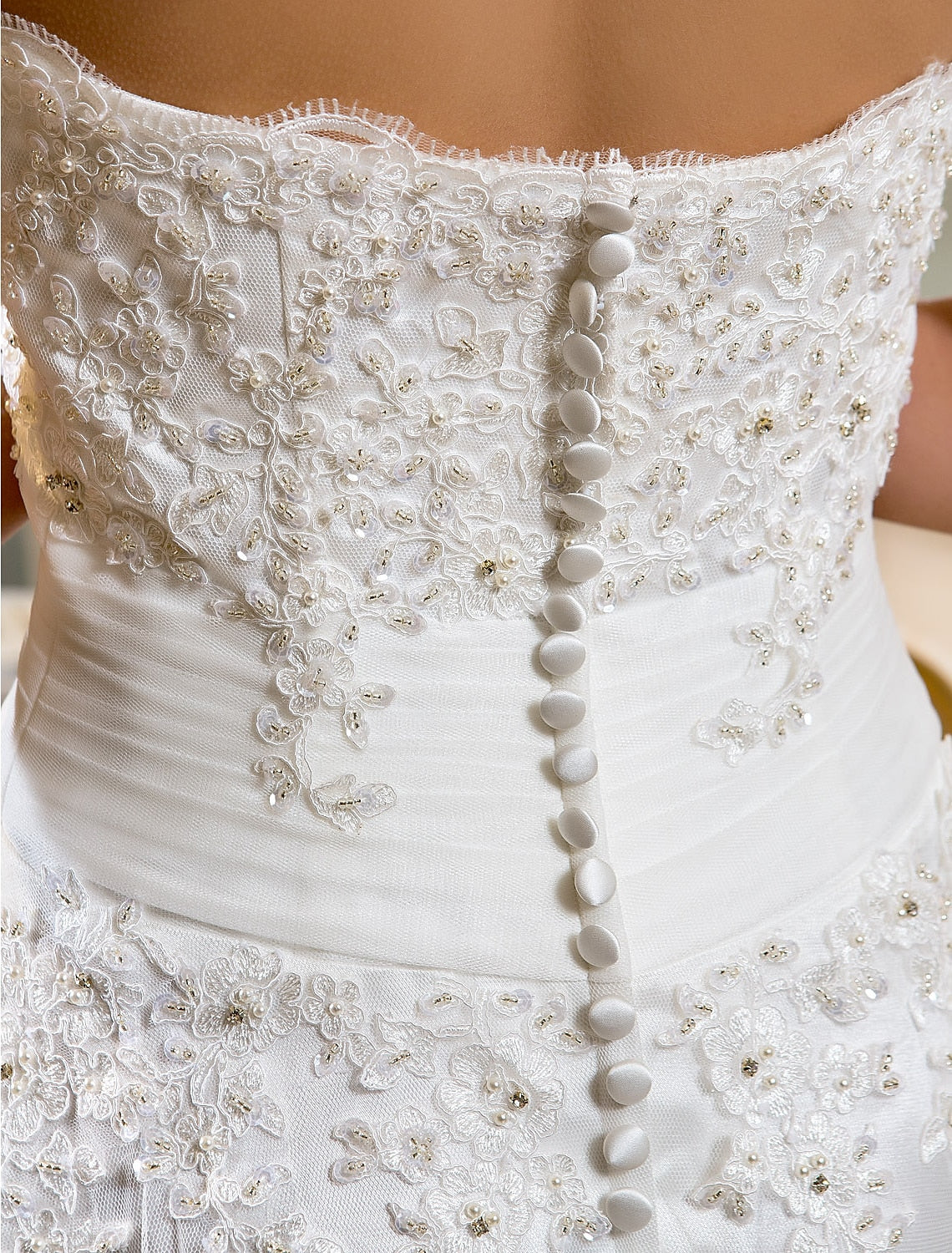 Model posing in the A-line lace reception dress, showcasing its flow.