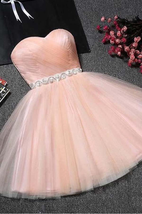 Blush pink strapless sweetheart neck short homecoming dress.