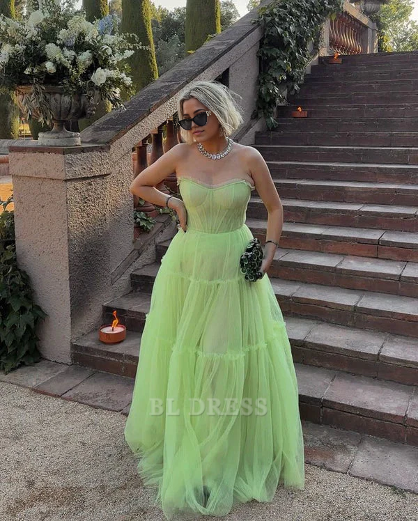 Green tulle A-line formal dress with sweetheart strapless neckline.